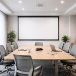 Écran de projection : choisir taille et luminosité pour salle de réunion agence